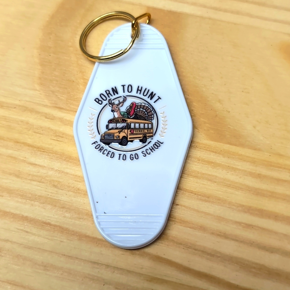 Born to hunt forced to go school white key chain